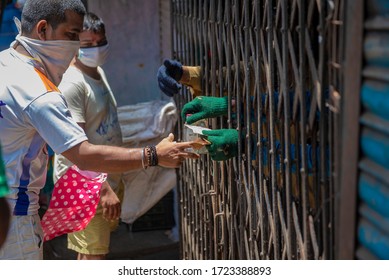 Mumbai / India 5 May 2020 Men Purchase Alcohol From A Government-controlled Outlet In A Prem Nagar Teen Dongri Goregaon West During Lockdown Period In Mumbai Maharashtra India