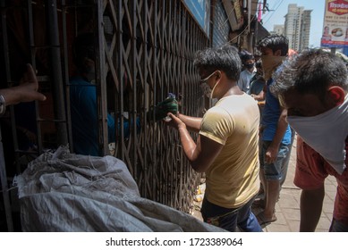 Mumbai / India 5 May 2020 Men Purchase Alcohol From A Government-controlled Outlet In A Prem Nagar Teen Dongri Goregaon West During Lockdown Period In Mumbai Maharashtra India