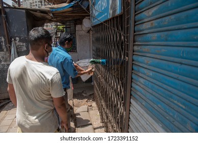 Mumbai / India 5 May 2020 Men Purchase Alcohol From A Government-controlled Outlet In A Prem Nagar Teen Dongri Goregaon West During Lockdown Period In Mumbai Maharashtra India