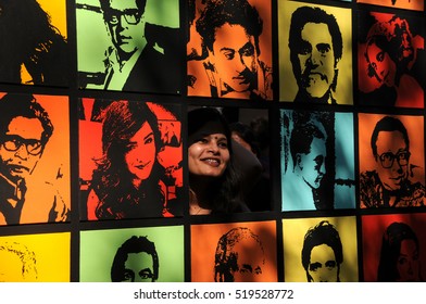 MUMBAI, INDIA, 8 FEBRUARY 2015 : unidentified people pose for photos and enjoy during the Kala Ghoda Arts Festival Mumbai,  Kala Ghoda Arts Festival is most popular cultural festival in Mumbai