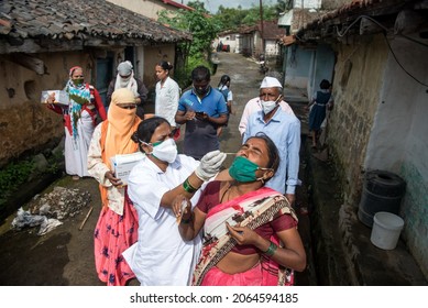 MUMBAI - INDIA - AUGUST 2, 2021: Health Workers Collects A Swab Sample From A Women For The Covid-19 Coronavirus Test At Village In Kolhapur.