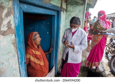 MUMBAI - INDIA - AUGUST 2, 2021: Health Workers Collects A Swab Sample From A Women For The Covid-19 Coronavirus Test At Village In Kolhapur.