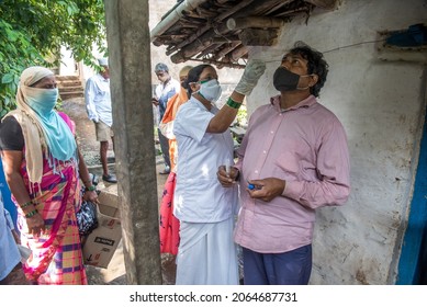 MUMBAI - INDIA - AUGUST 2, 2021: Health Workers Collects A Swab Sample From A Man For The Covid-19 Coronavirus Test At Village In Kolhapur.