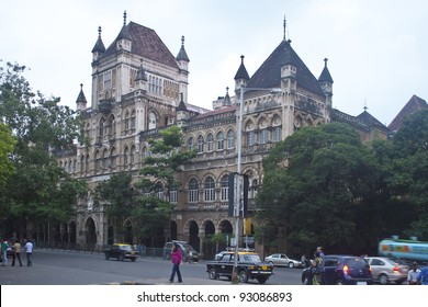 MUMBAI, INDIA - AUGUST 21: Traffic On A Street On August 21, 2011 In Mumbai, India. The Architecture Of Mumbai Blends Gothic, Victorian, Art Deco And Indo-Saracenic Architectural Styles.