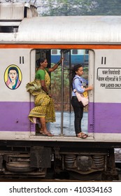 Mumbai, India - February 29, 2016: Unidentified Women Traveling Via Suburban Train In Ladies Only Carriage In Mumbai, India. 