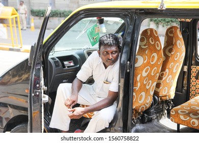 Mumbai, India - May 2019 - Taxi Driver In A Car