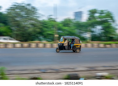 MUMBAI, INDIA - September 20, 2020 : An Auto Rickshaw Driver Wearing Protective Mask During Covid-19 Pandemic, Famous Three Wheel Public Transport In Mumbai