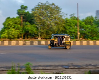 MUMBAI, INDIA - September 20, 2020 : An Auto Rickshaw Driver Wearing Protective Mask During Covid-19 Pandemic, Famous Three Wheel Public Transport In Mumbai