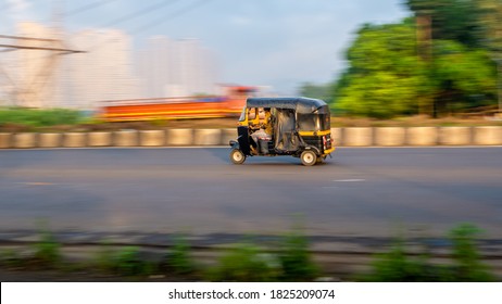 MUMBAI, INDIA - September 20, 2020 : An Auto Rickshaw Driver Wearing Protective Mask During Covid-19 Pandemic, Famous Three Wheel Public Transport In Mumbai