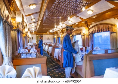 MUMBAI, MAHARASHTRA, INDIA 21 MARCH 2015 : Attendants Of The Deccan Odyssey Luxurious Passenger Train. Deccan Odyssey Train Providing A Luxury Travel Experience Magnificent History Of India.