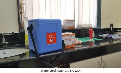 Mumbai, Maharashtra, India, April 13 2021: The Blue Vaccine Storage Box For Carrying Covid 19 Vaccine For Administering The Vaccination. Shot At Godrej Hospital, Mumbai