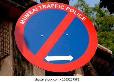 Mumbai; Maharashtra; India- Asia; April, 01, 2009 - Red And Blue Color Sign Board Showing Mumbai Traffic Police 