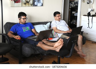 Mumbai Maharashtra India Asia Aug. 12 2018; Work From Home Concept Indian Father And Son Working On Laptop At Home