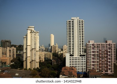 Mumbai; Maharashtra; India- Asia; Feb, 2015 :  View of The Skyscrapers & Mud roof old building in foreground Tardeo Bombay    - Shutterstock ID 1414322948