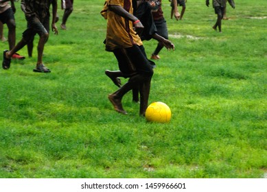 223 Kids playing football in rain Images, Stock Photos & Vectors ...