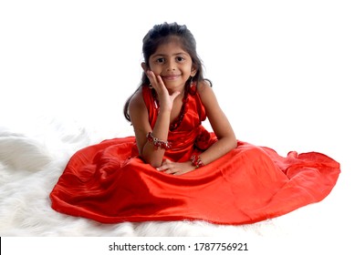 Mumbai; Maharashtra; India; Asia; June. 22; 2008 - Portrait Of Beautiul Indian Six  Years Old Cute Little Girl Smiling Face And Long Black Hair On White Background