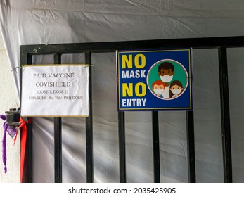 Mumbai, Maharashtra, India - August 2021: Sign Outside The Gate Of A Private Hospital Advertising The Coronavirus Covishield Vaccine And A 