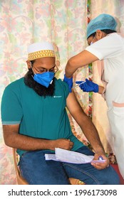 Mumbai, Maharashtra, India - CIRCA May 2021: A Dawoodi Bohra Member Gets Vaccinated For Covid-19  During The Coronavirus Pandemic In Mumbai, Maharashtra, India 