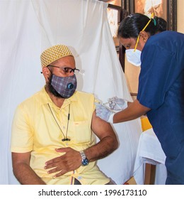 Mumbai, Maharashtra, India - CIRCA May 2021: A Dawoodi Bohra Member Gets Vaccinated For Covid-19  During The Coronavirus Pandemic In Mumbai, Maharashtra, India 