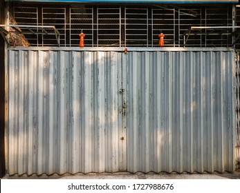 Mumbai, Maharashtra, India - December 2019: The Metal Shutters Of A Closed Shop On The Streets Of The City.