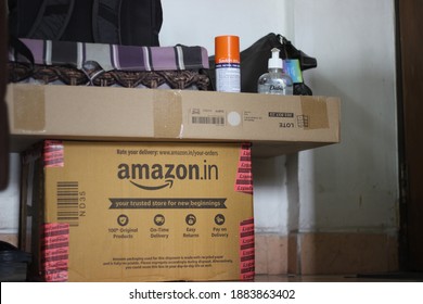 Mumbai, Maharashtra, India, December 29 2020: Alternate Use Of Empty Amazon Pantry Bulk Delivery Cartons, Used At The Entrance Of The Home For Temporary Stocking Bags, Hand Sanitisers And Mask