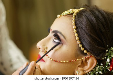 Mumbai Maharashtra India July 06 2019 Selective Focus Wedding Makeup Artist Making A Makeup For Bride Beautiful Indian Bride Getting Ready Close-up Of Face Bridal Makeup