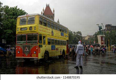 Mumbai Maharashtra India July 25 2008 Heavy Rain And People With Umbrella And Traffic Police Help To Clear The Road