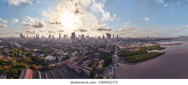 Mumbai Skyline with Dramatic Clouds at Sunset, Maharashtra, India. 