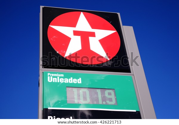 Mumbles, Wales, UK, February 23, 2016 :  A  Texaco\
petrol station sign on the Mumbles Road, Swansea bay, showing its\
company logo and\
prices