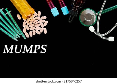 Mumps Text On Medical Background With Pills And Syringes Concept Of Human Disease