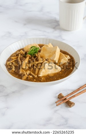 Mun tahu or mun tofu is a chinese dish made from tofu, minced meat and mushroom