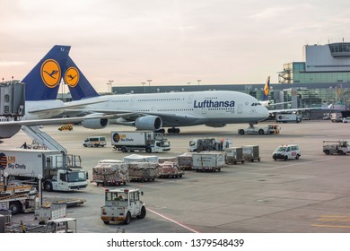 Munchen, Germany, 2018, April, Airliner Taxiing Out Of An Airport With A Tug