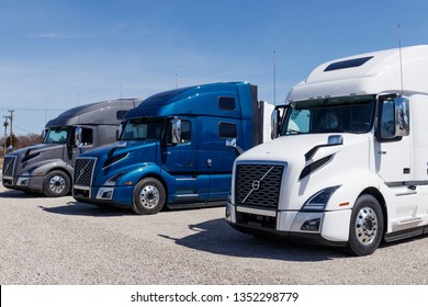 Muncie - Circa March 2019: Colorful Volvo Semi Tractor Trailer Trucks Lined up for Sale. Volvo is one of the largest truck manufacturers I