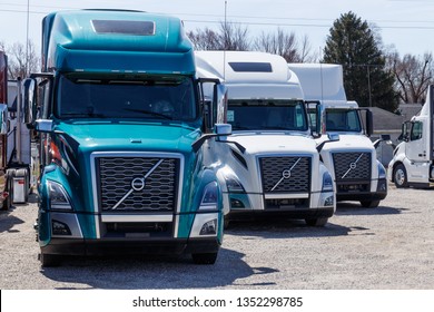 Muncie - Circa March 2019: Colorful Volvo Semi Tractor Trailer Trucks Lined up for Sale. Volvo is one of the largest truck manufacturers IV
