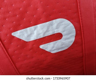 Muncie,Indiana / United States May/17/2020: Red Doordash Bag With White Logo