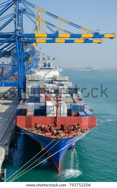 Mundra, India -\
December 31:  Container vessel in port of Mundra on December 31,\
2017  in Mundra, India.