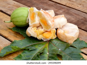 mung bean pia cake on wooden board