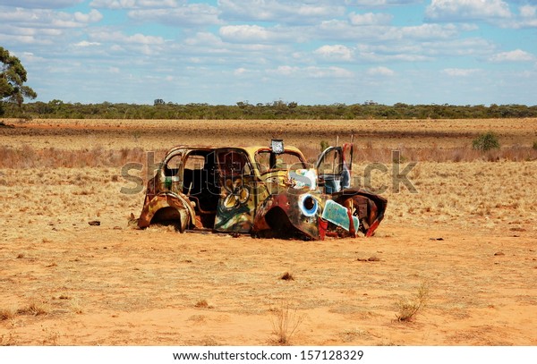 MUNGO NATIONAL PARK, AUSTRALIA - MARCH 10: Old painted\
car. The central feature of the Park is Lake Mungo, the second\
largest of the ancient dry lakes. Mungo National Park, Australia -\
March 10, 2013 