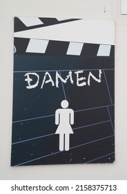                    Munich Bavaria Germany - april 15 2022  Munich movie park with film  slap toilet sign    translation Ladies         
