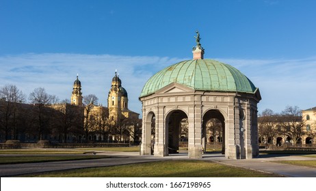 Munich, Bavaria / Germany - Feb 21, 2020: Panorama With Dianatempel (Temple Of Diana), Located In The Center Of The Hofgarten (garden Of The Former Royal Palace). In The Back The Theatinerkirche.