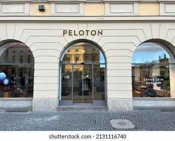 Munich, Bavaria Germany - February 22, 2022: Peloton High End Fashion At Home Fitness Bike Sports Store - Shop Front With Logo In Munich Germany.