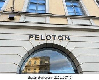 Munich, Bavaria Germany - February 22, 2022: Peloton High End Fashion At Home Fitness Bike Sports Store - Shop Front With Logo In Munich Germany.