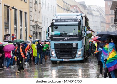 MUNICH, BAVARIA / GERMANY - JULY 13, 2019: A Big Truck /float/ And People Attending The Gay Pride Parade Also Known As Christopher Street Day (CSD) In Munich, Germany. 