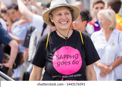 MUNICH, BAVARIA / GERMANY - JULY 14, 2018: An Older Woman Wearing A Tshirt 