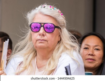 MUNICH, BAVARIA / GERMANY - JULY 14, 2018: An Older Woman With Glasses Attending The Gay Pride Parade Also Known As Christopher Street Day (CSD) In Munich, Germany.