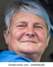 MUNICH, BAVARIA / GERMANY - JULY 14, 2018: A Smiling Older Woman Attending The Gay Pride Parade Also Known As Christopher Street Day (CSD) In Munich, Germany. 