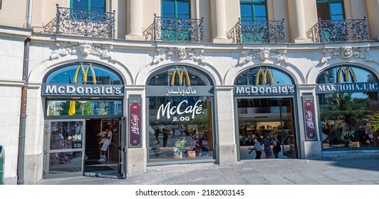 Munich, Bavaria, Germany - July 22 2022:  Mc Donald's Take Away Restaurant.  The Brand Name Is Written In Different Languages.  An International Take Away Food Icon. 