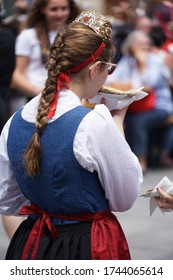 Munich, Bavaria / Germany - June 18, 2017: Young Girl With Braided Hair Wearing A Traditional Bavarian 