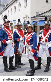 Munich, Bavaria / Germany - June 18, 2017: Group Of Costumed Men In A Traditional Patriotic Uniform Of The Munich Militia With Shouldered Arms Posing At The Festival Of The Foundation Of The Town