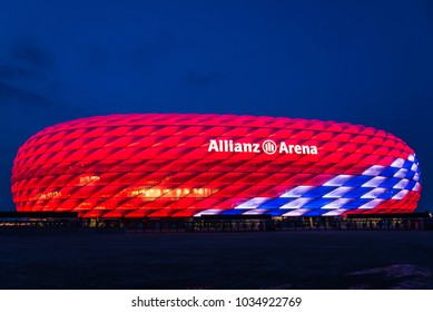 MUNICH, GERMANY - 27 February 2018: Allianz Arena special illumination for FC Bayern Munich 118th Birthday with bright red and white-and-blue diamonds